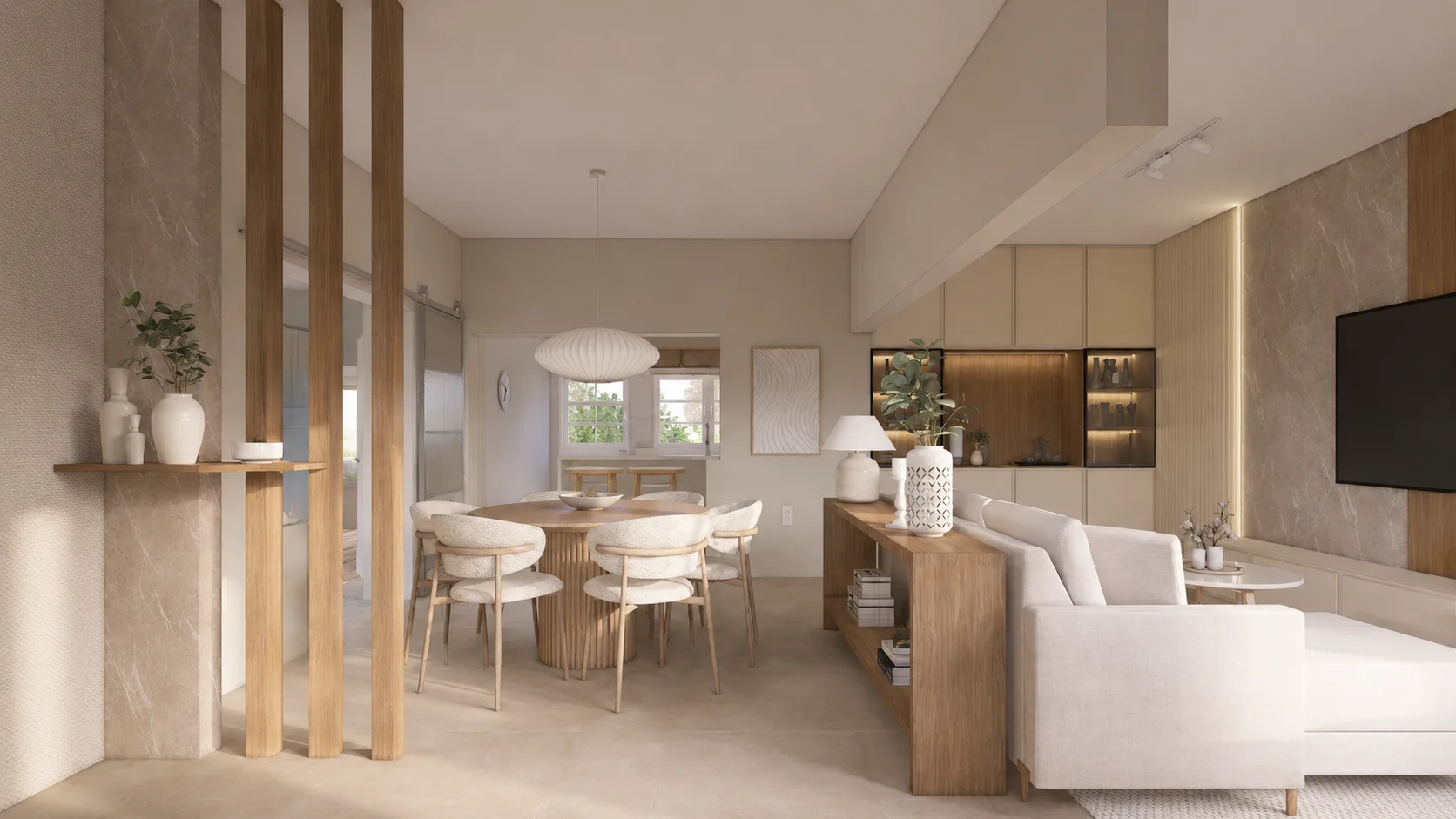 Living comedor del proyecto La Paz con mesa redonda de madera, sillas tapizadas en bouclé, lamas verticales de roble y mueble a medida