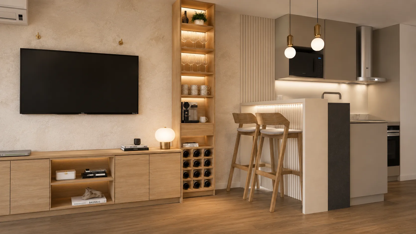 Living del proyecto Magallanes con mueble bajo de roble a medida, cava, barra de desayuno y cocina integrada, diseñado por MÚKAMÜ HOME